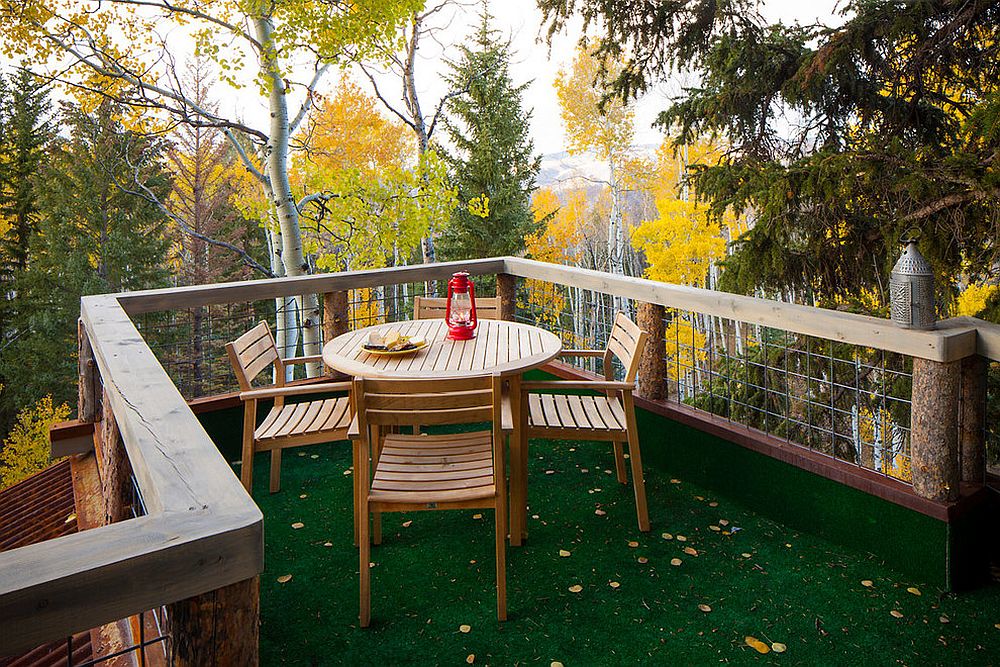 Smart rustic deck of the treehouse takes you into the forest canopy [Design: Missy Brown Design / Photo: David Patterson Photography]