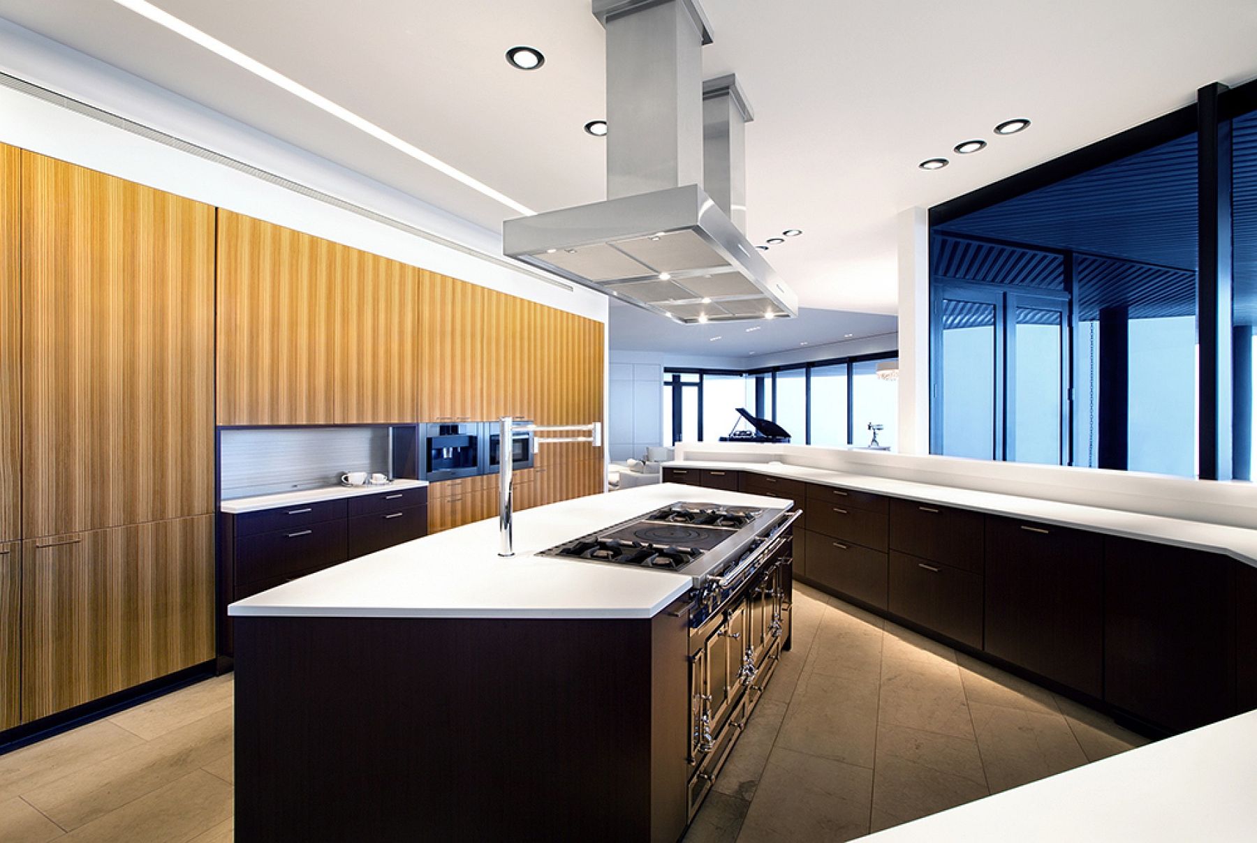 Spacious contemporary kitchen with unique workstation and state-of-the-art island