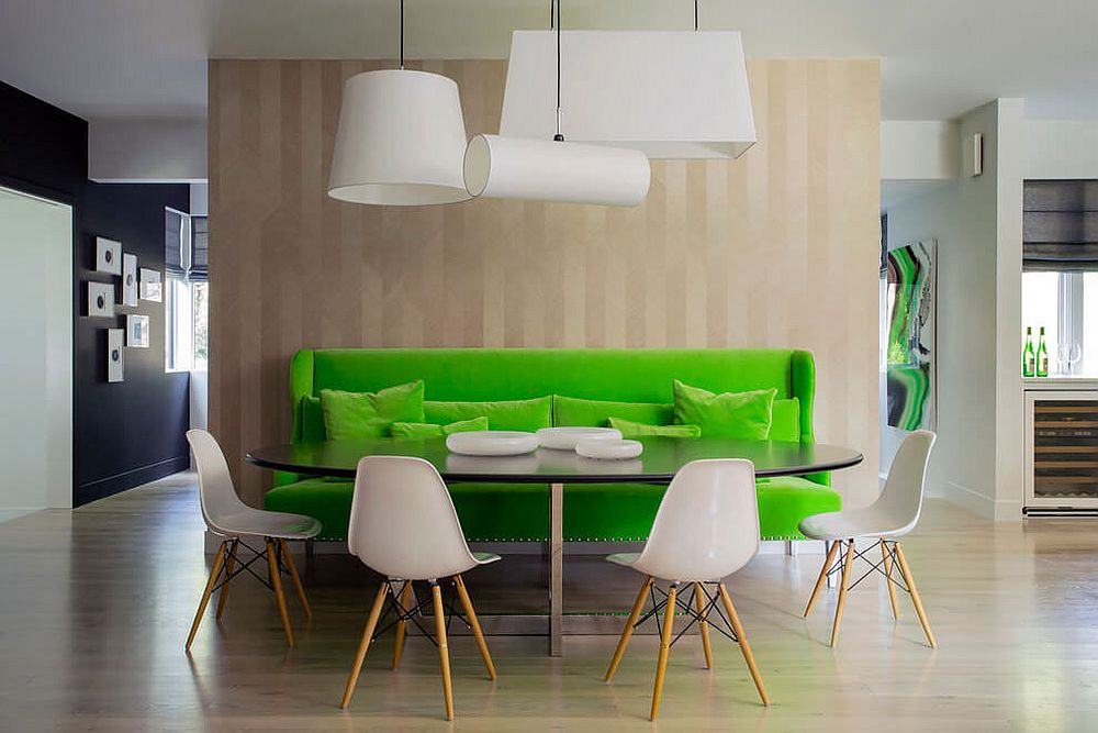 Striking green bench defines the dining area