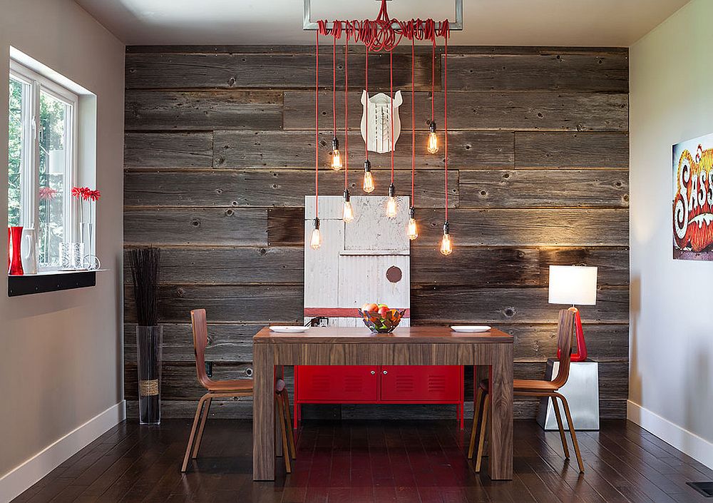 Stunning industrial modern dining room with a hint of red and reclaimed wood feature wall [Design: Jordan Iverson Signature Homes]