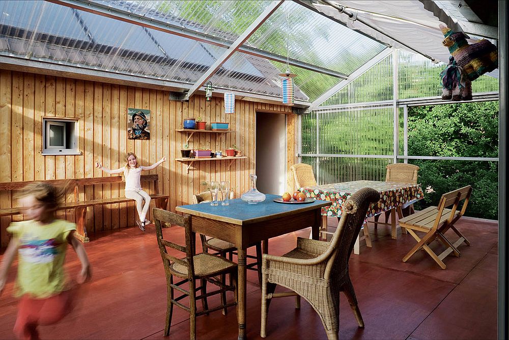 Sturdy and all-weather outdoor decor is perfect for the radiant sunroom [Design: ballast architects]