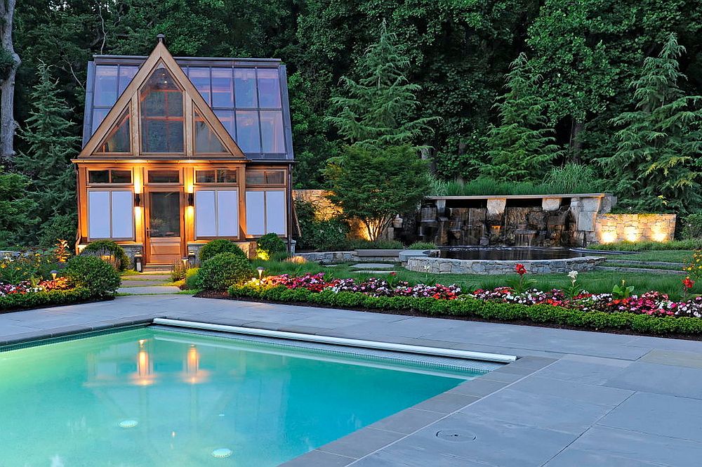 Style of the pool house perfectly complements that of the landscape around it [Design: SURROUNDS Landscape Architecture + Construction / Photography: Bob Narod]