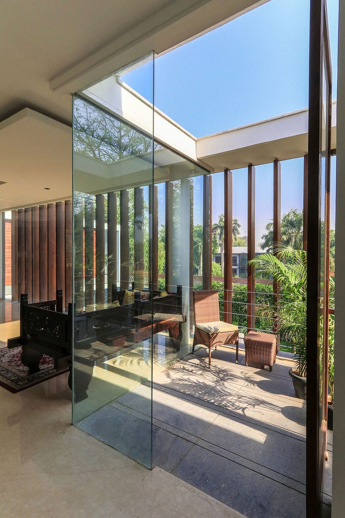 Sunroom on the top level with glass walls and ceiling