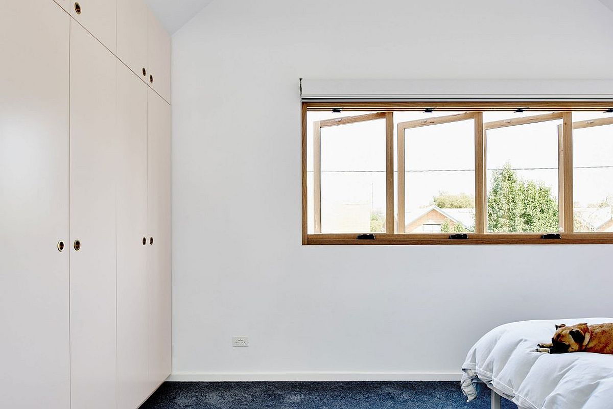 Swiveling windows bring in natural freshness into the bedroom