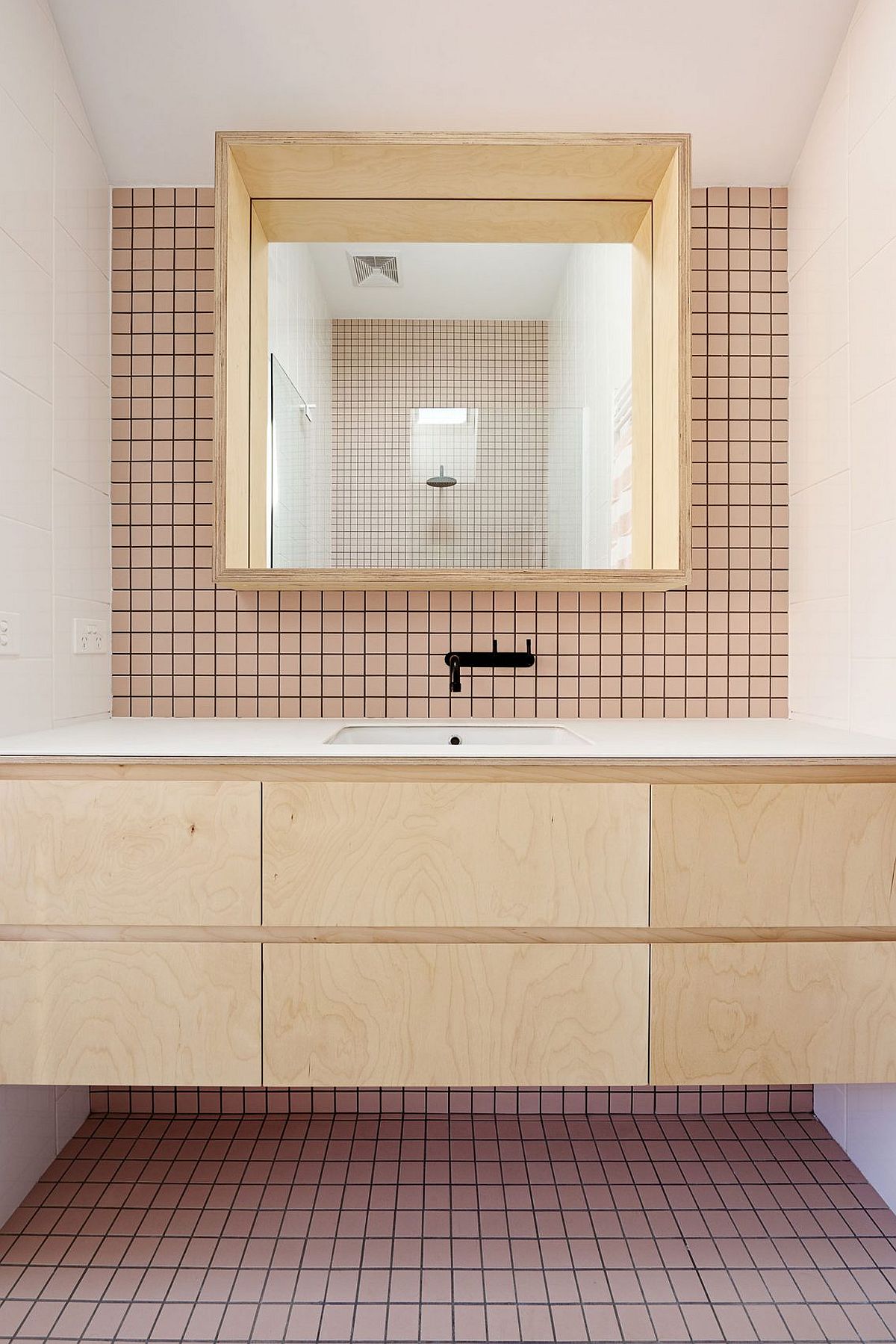 Tiles add smart geometric pattern to the small bathroom