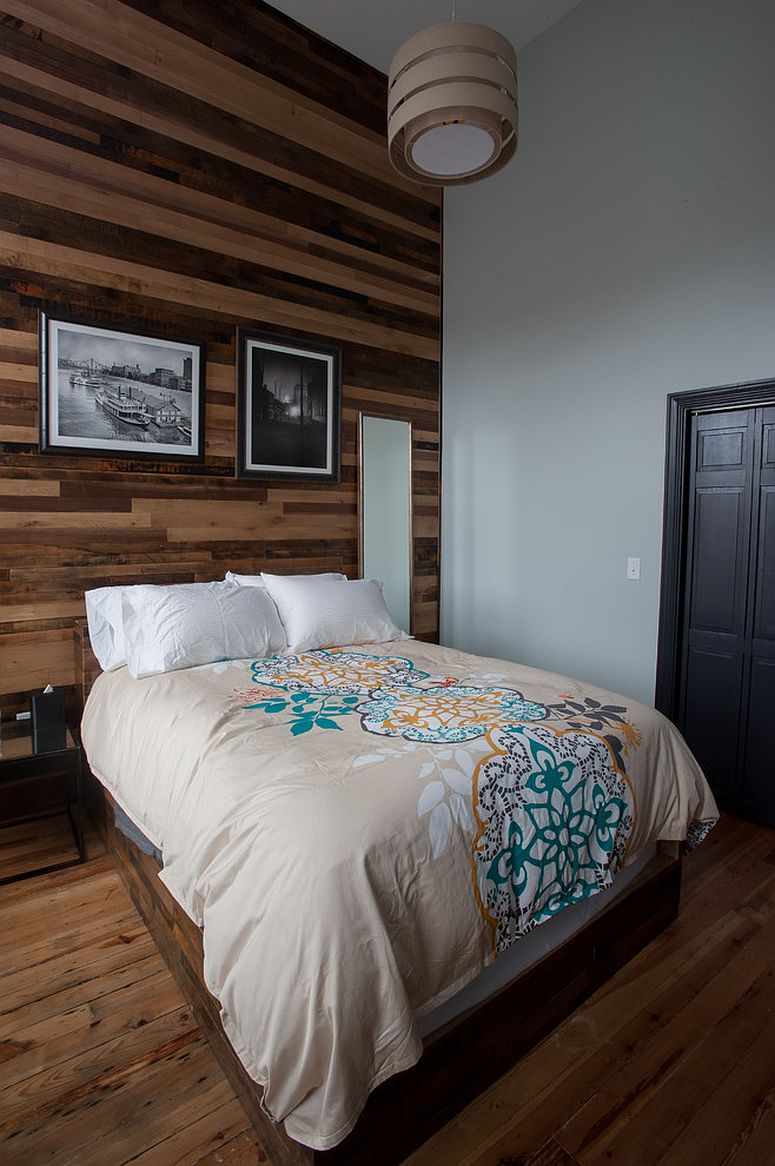 Wall draped in reclaimed wood is an instant showstopper in the contemporary bedroom