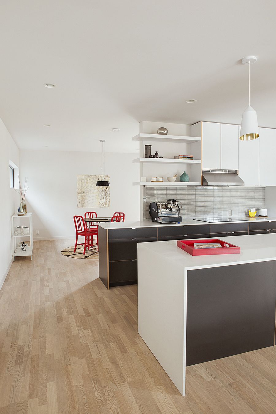 White and gray kitchen with smart pendant lighting