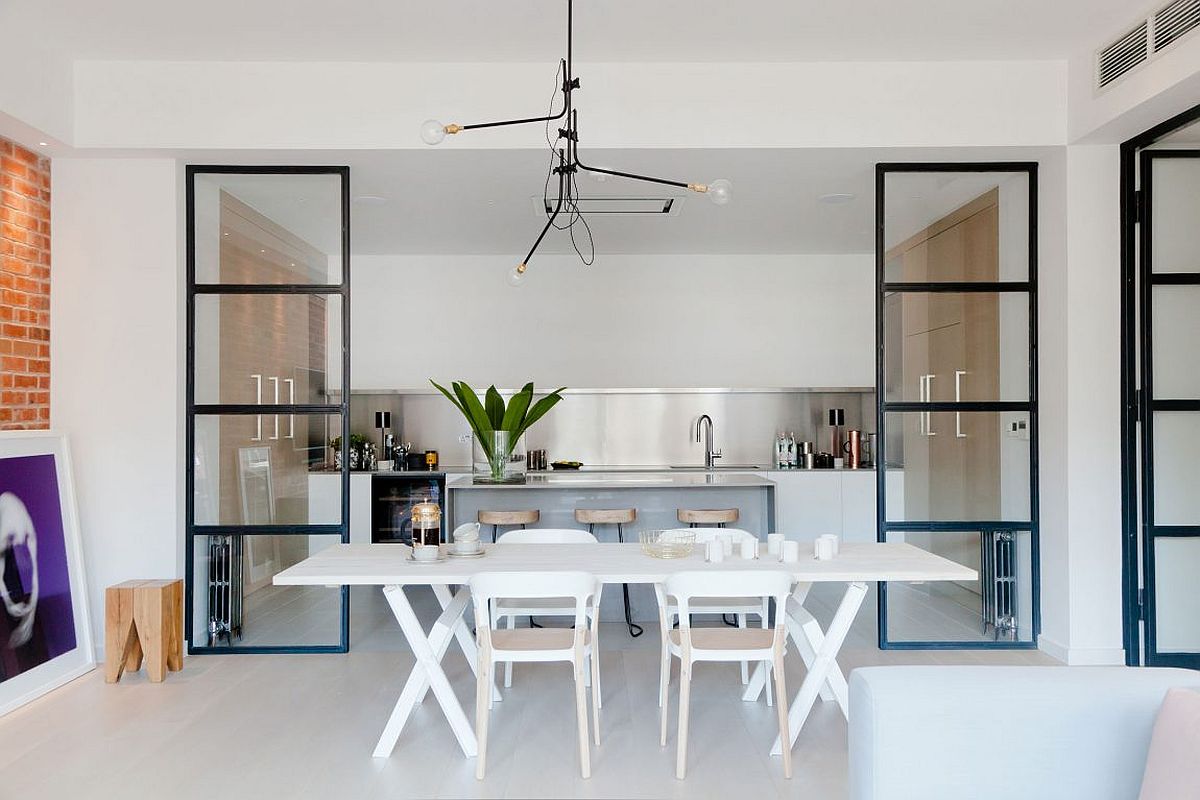 White dining table and chair set blends into the backdrop effortlessly