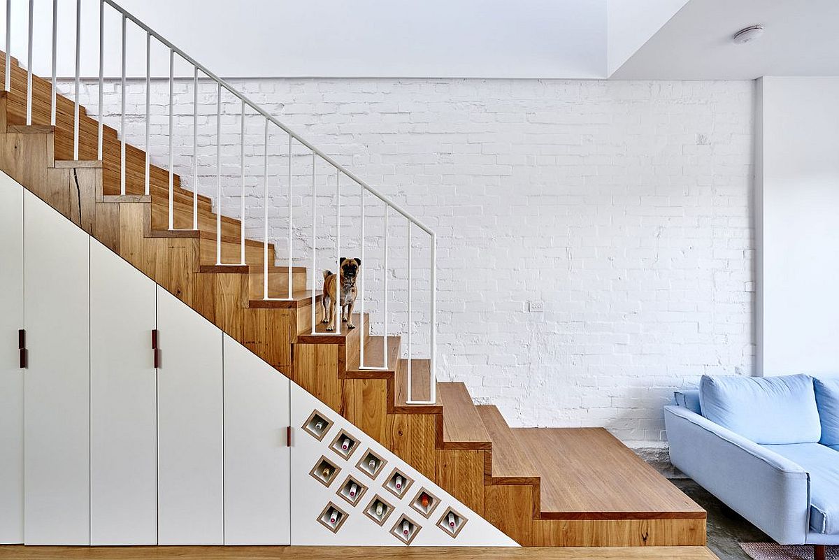 Wine storage and additional storage shelves under the staircase