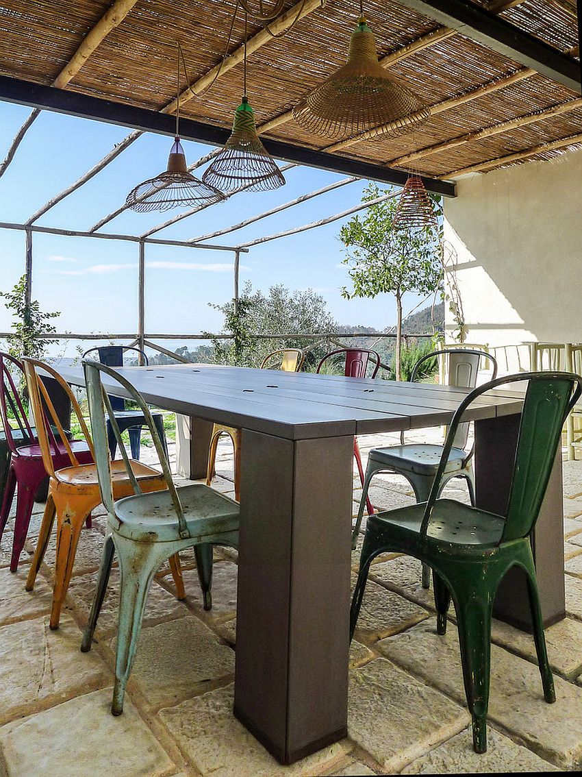 Woven rattan roof and reclaimed decor for the snazzy industrial sunroom