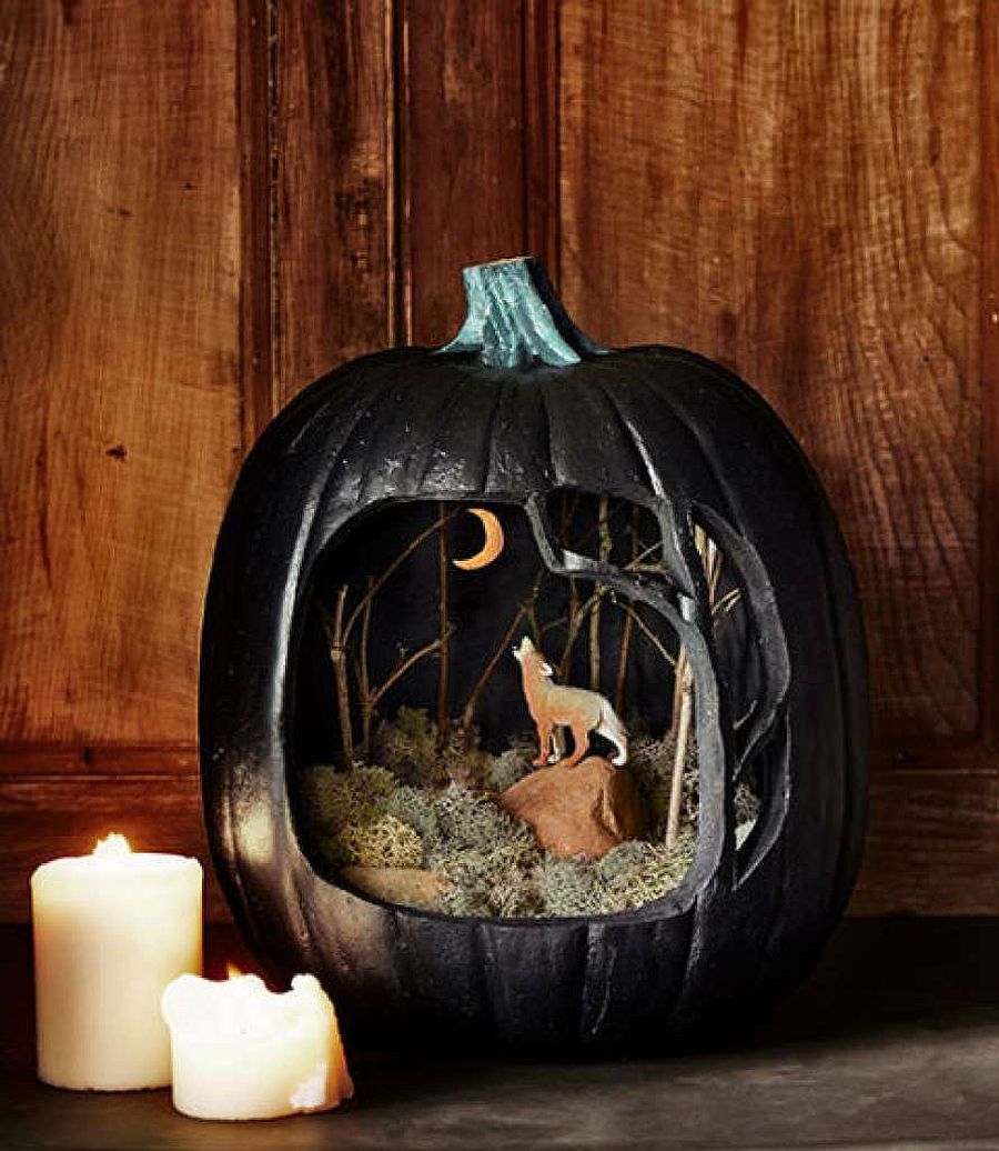 A haunting scene crafted using pumpkin with a cool diorama [From: Country Living]