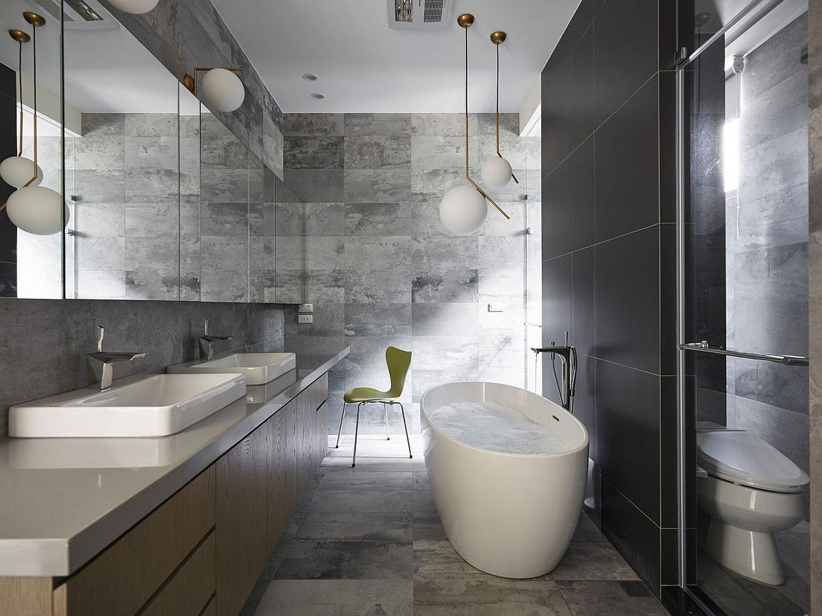 Black and gray bathroom with standalone bathub