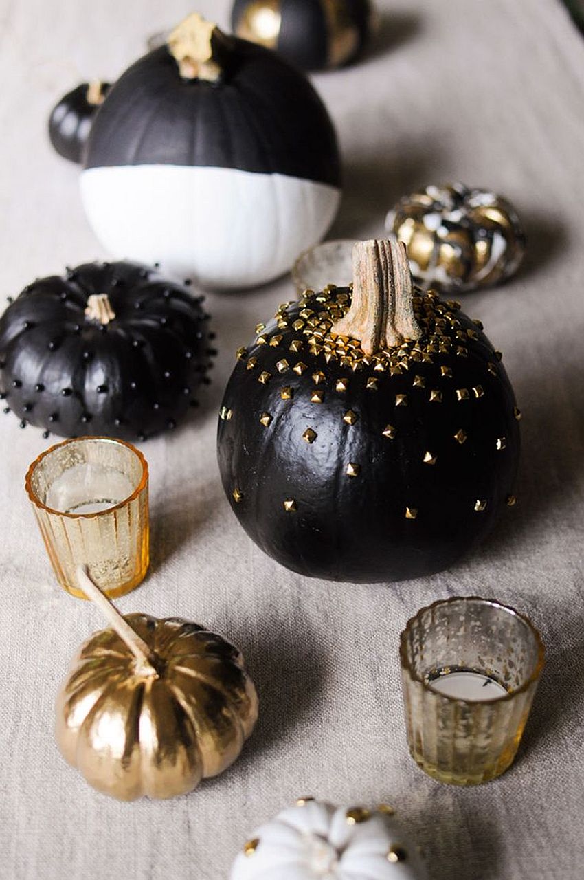 Black surely brings Halloween vibe to pumpkin decoration