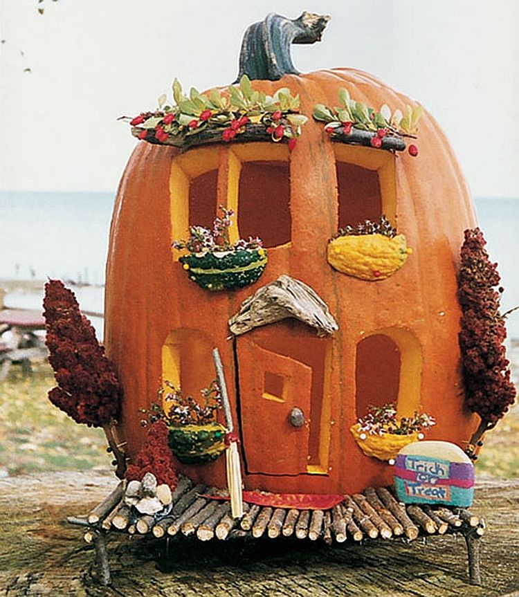 Carefully carved Housed pumpkin is set to become the showstopper among all your Halloween decorations [From: Good Housekeeping]