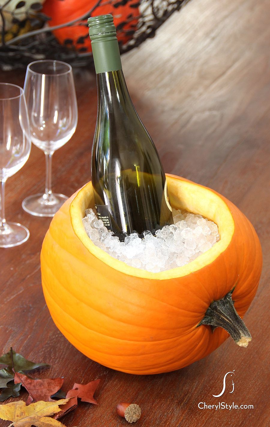 Carved wine cooler pumpkin for a fun Halloween [From: Cheryl Style]