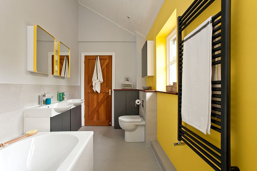 Contemporary bathroom in yellow and gray with ample natural light [Design: InStil Design Limited / Photo: Fraser Marr]