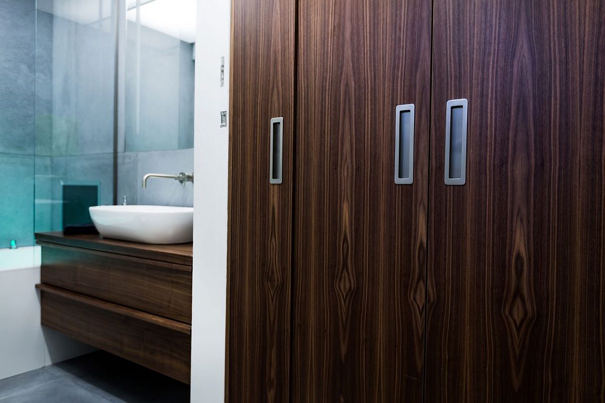 Contemporary bathroom of London penthouse in concrete and oak