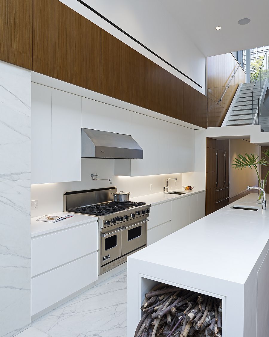 Contemporary kitchen with sixteen-foot-long Corian kitchen island