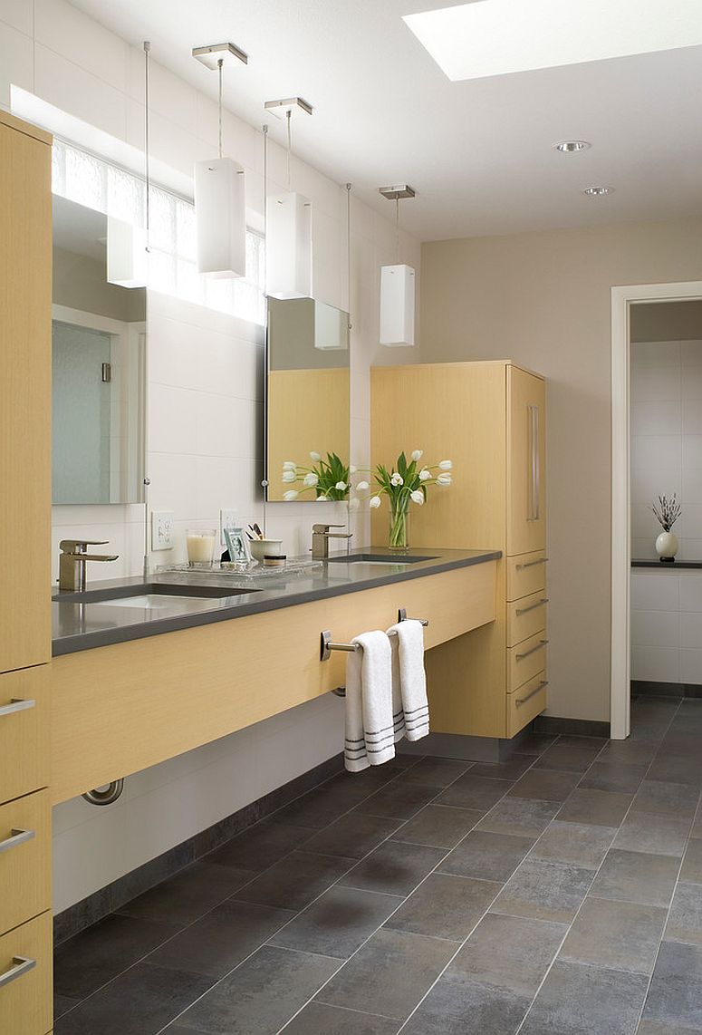 Custom designed cabinets bring yellow to the contemporary bathroom [Design: Hart STUDIO LLC]