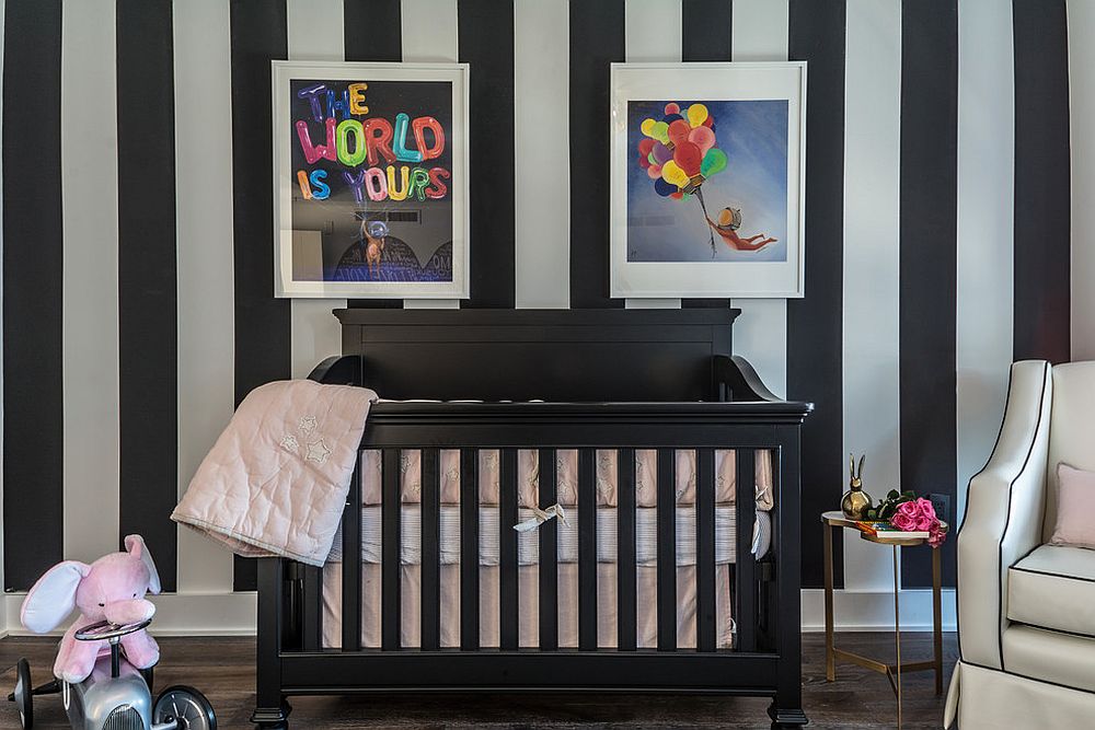 Custom striped accent wall in black and white and crib in black for the chic contemporary nursery [Design: CD Interiors / Gerard Garcia]