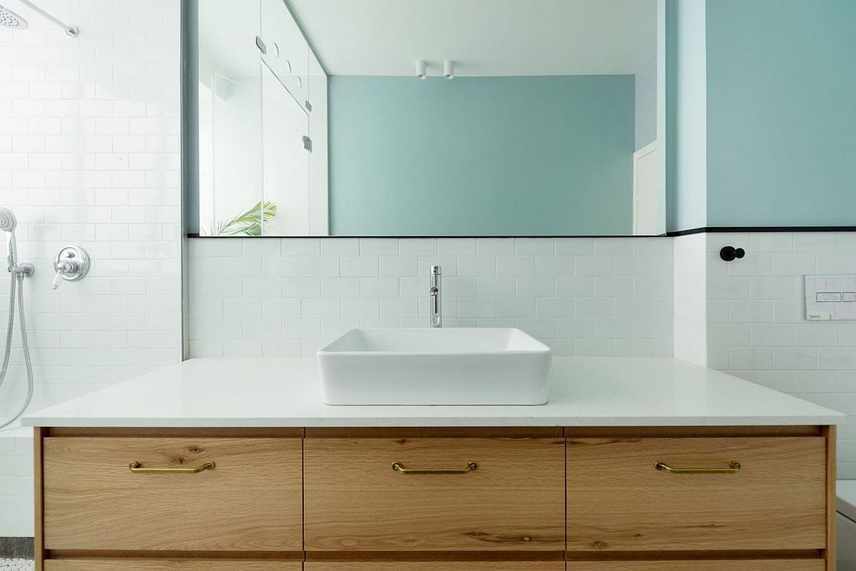 Custom wooden vanity for the modern bathroom in white and light blue
