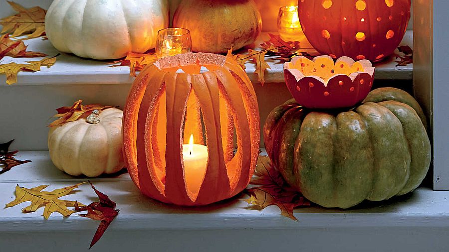 DIY decorative votive holders carved from pumpkins for Halloween [Photo: Laurey W. Glenn]