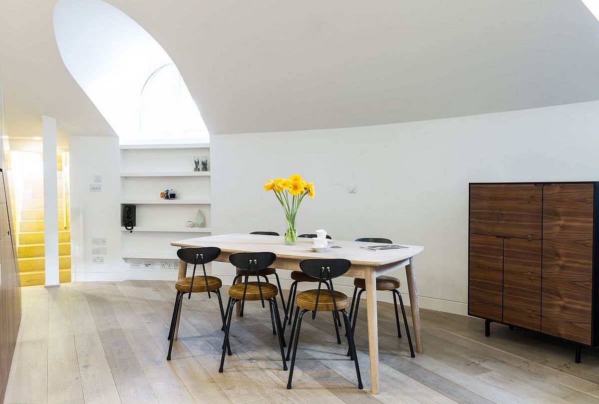 Dining area of the contemporary penthouse inside a revamped orthodox church