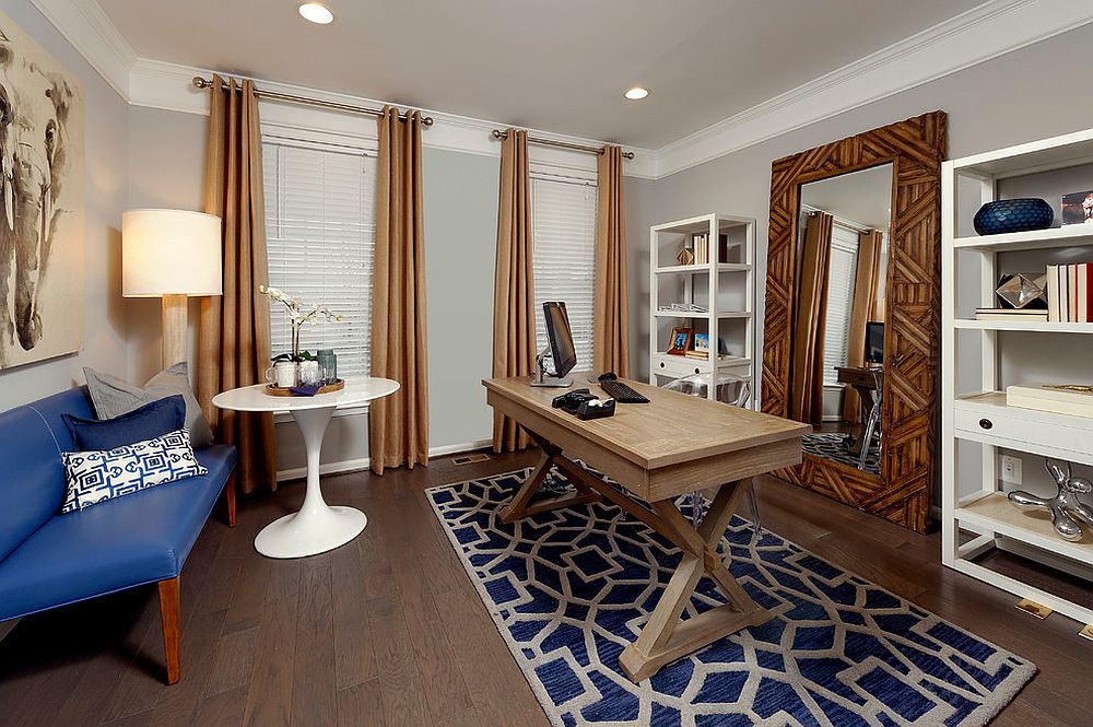 Giant mirror and a small coffee zone set this home office apart from the usual