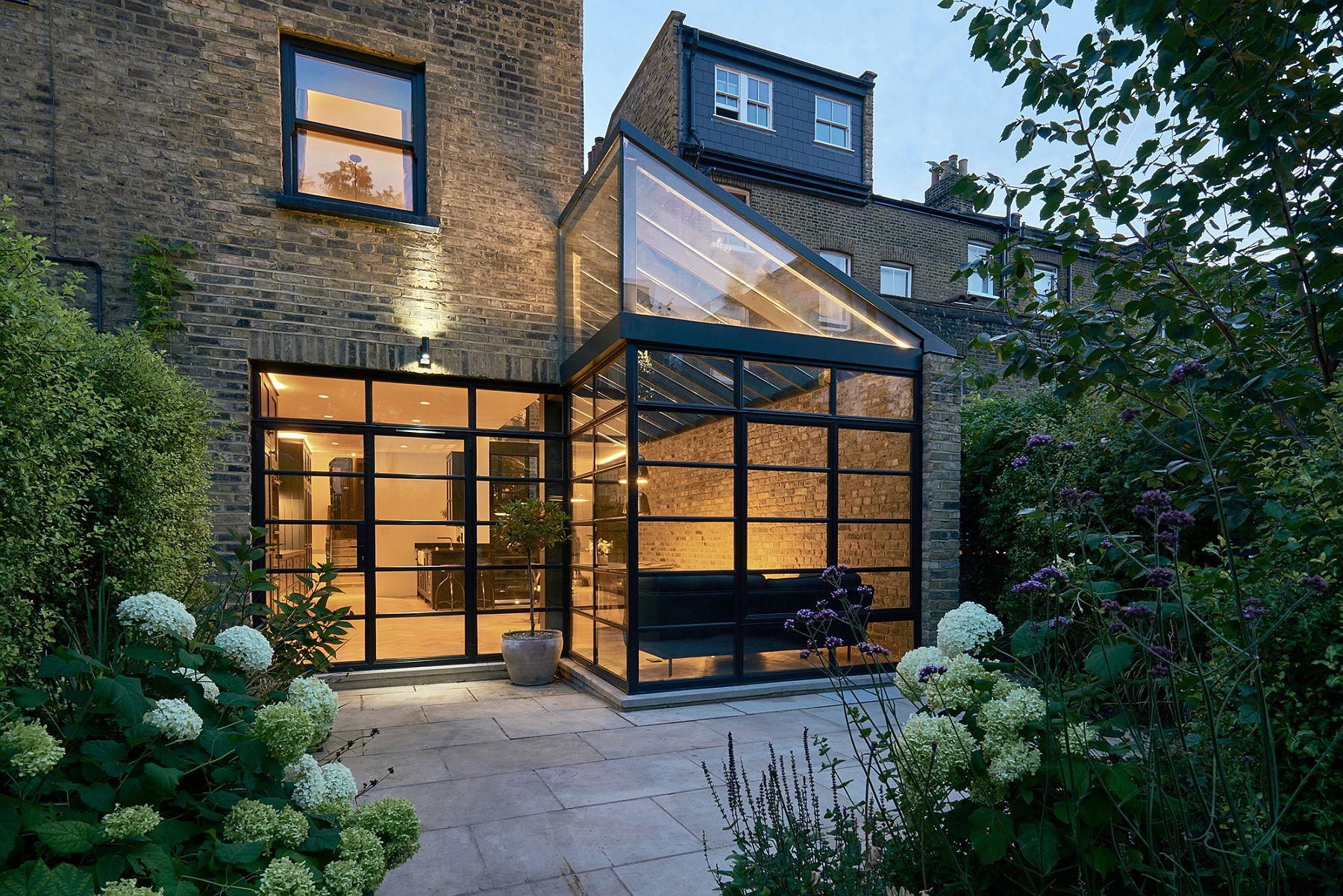 Glazed modern extension of classic victorian terrace house in Highbury