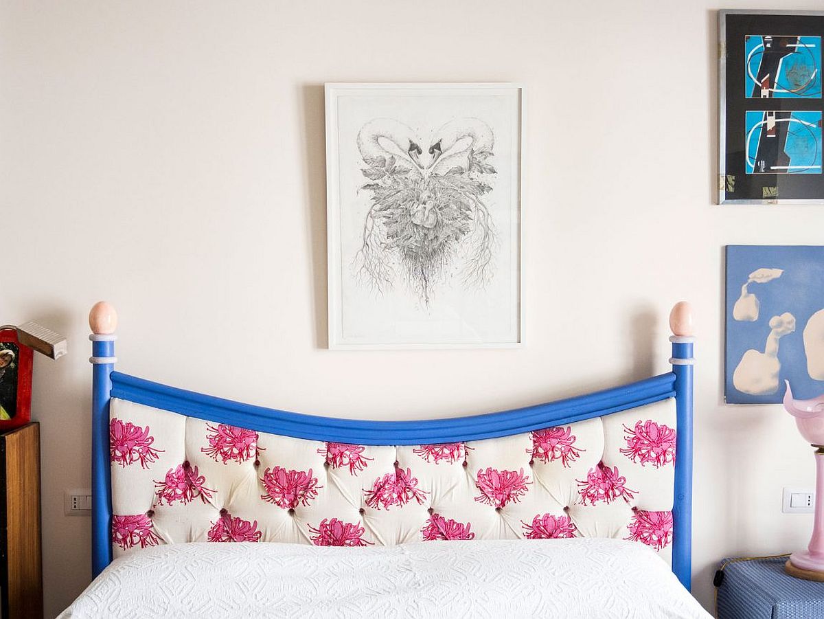 Gorgeous tufted headboard in blue with pops of fuchsia