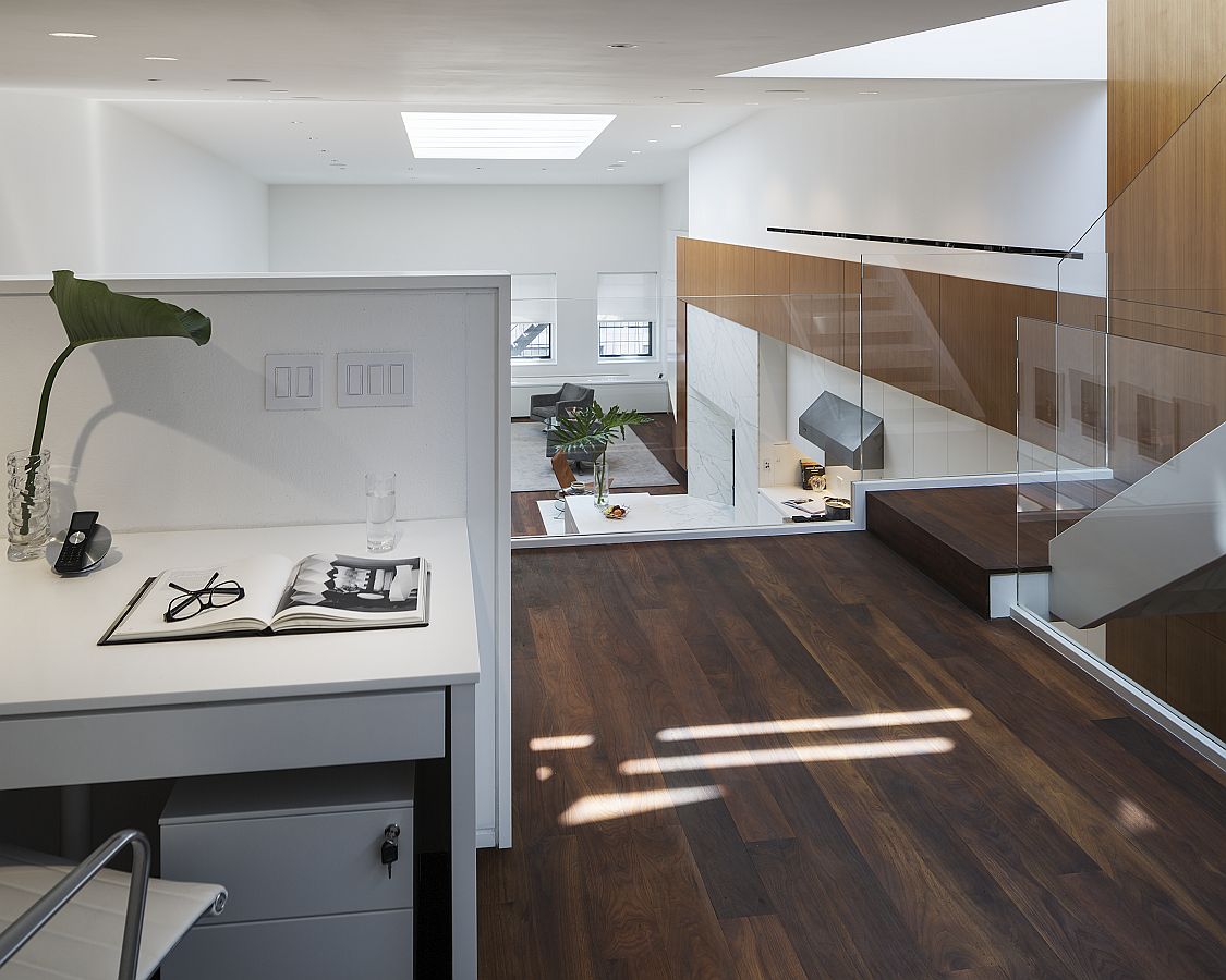 Mezzanine level workspace that overlooks the living area