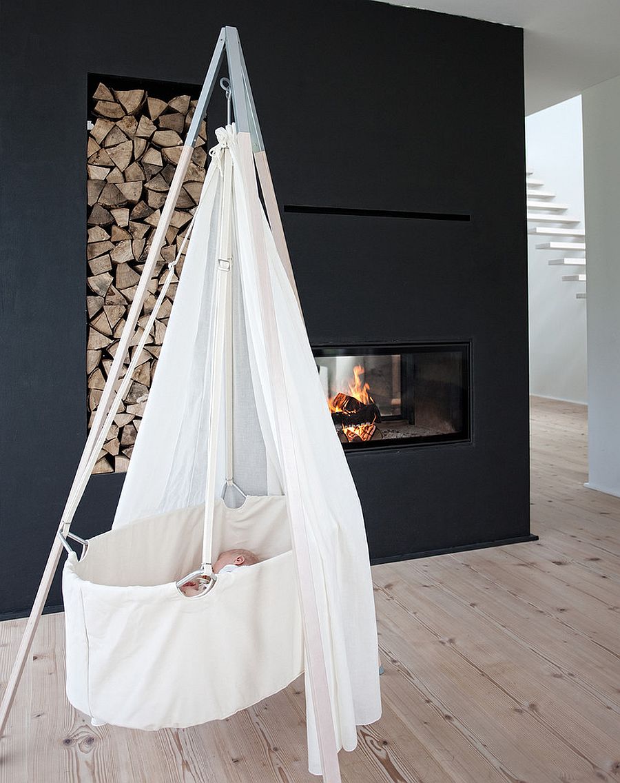 Minimal Scandinavian nursery design idea with fireplace [Design: Cuckooland]