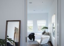 Mirror-placed-casually-on-the-floor-adds-to-the-ambiance-of-the-bedroom-217x155