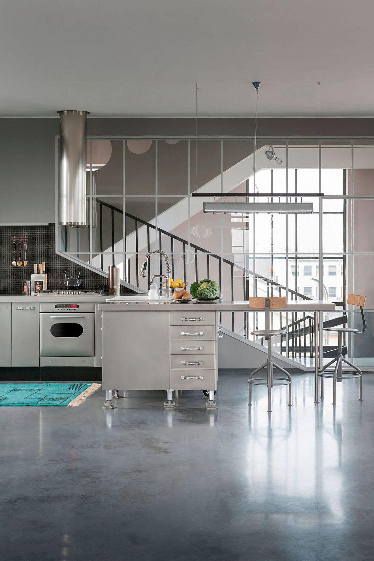 Modern industrial kitchen with a sparkle of stainless steel