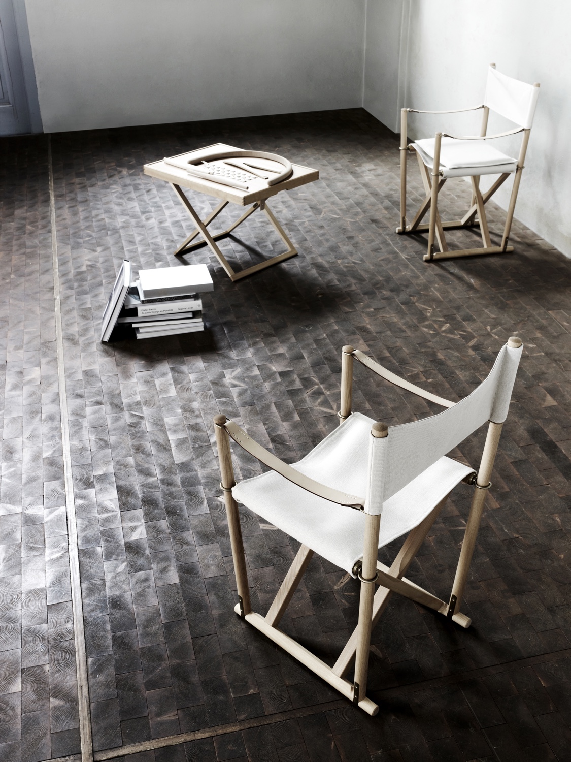 Mogens Koch's Folding Chair was designed in 1932. Seat and backrest in canvas. Image courtesy of Carl Hansen & Søn.