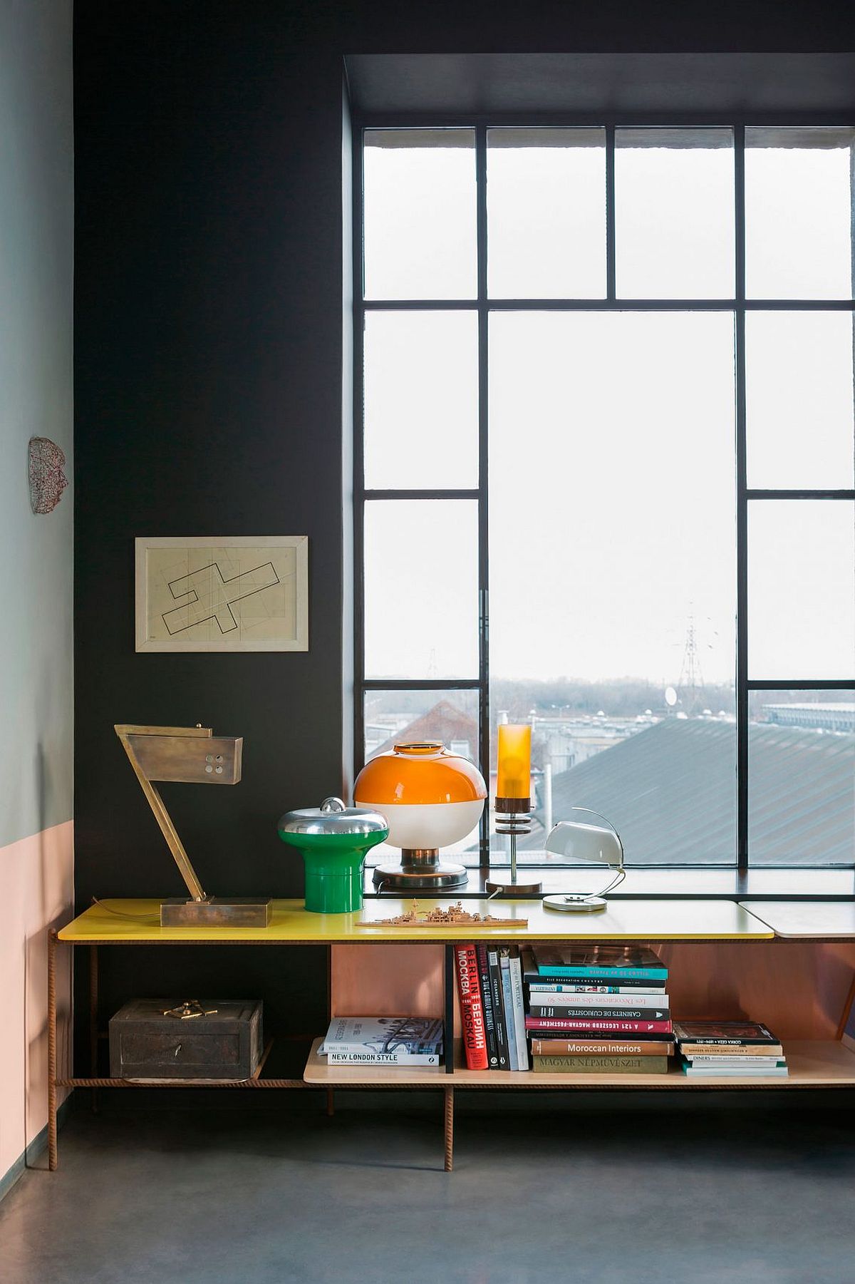 Original beams of the house turned into smart bookshelves