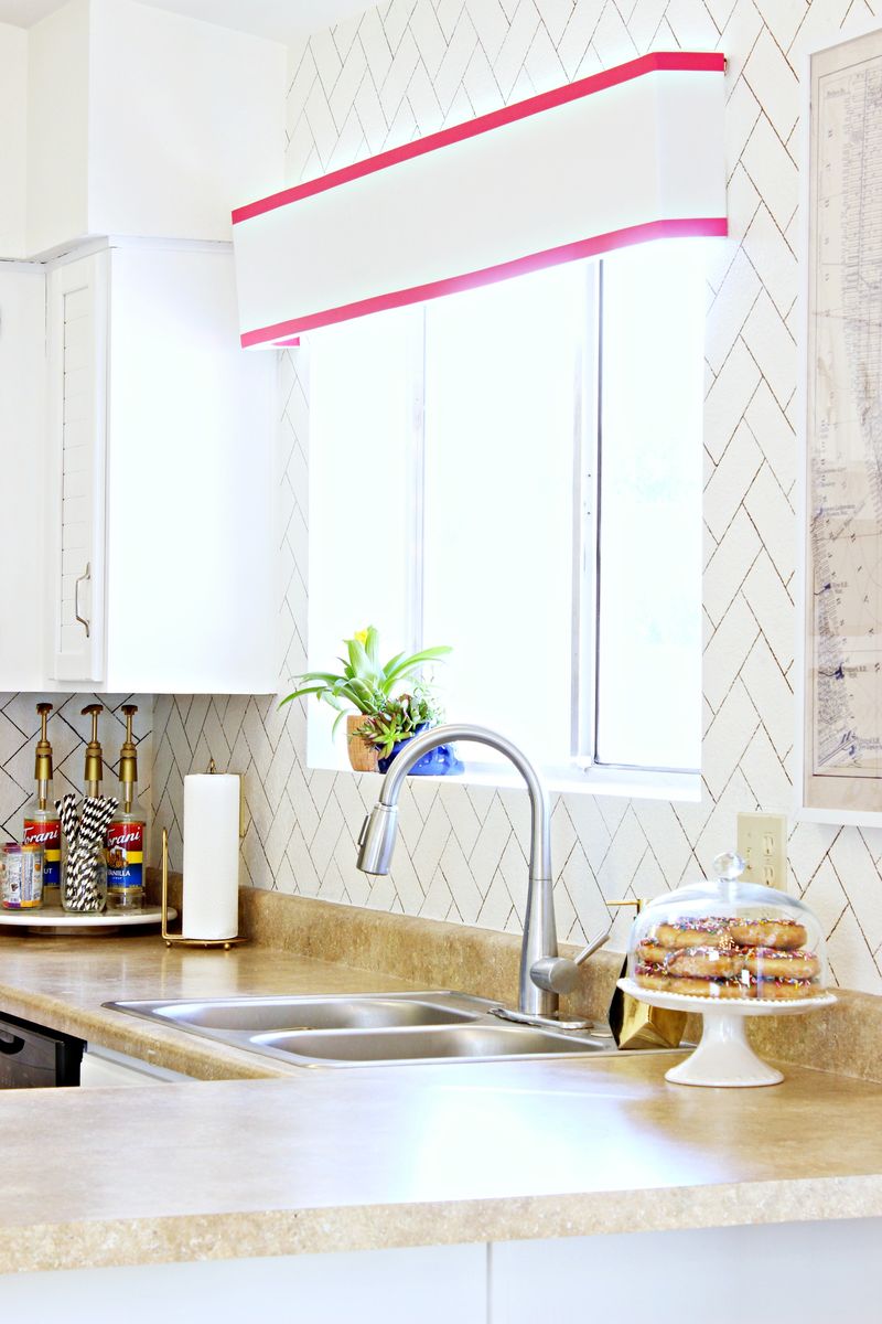 Painted herringbone backsplash from A Beautiful Mess