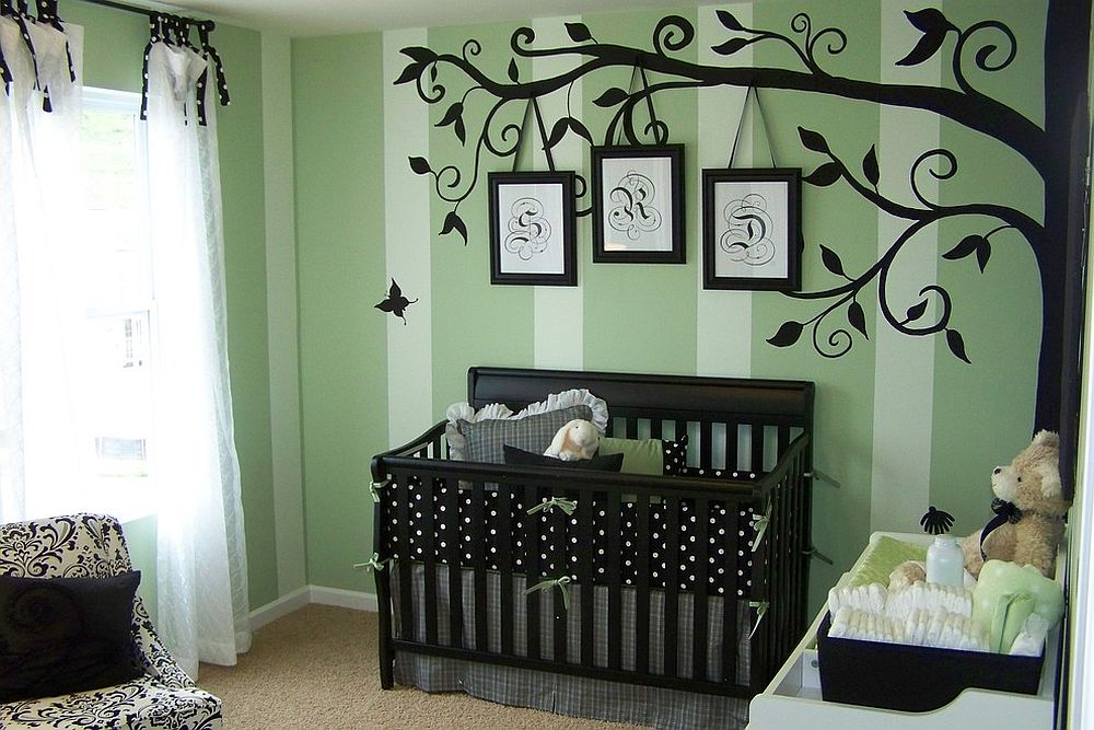 Painted tree in black defines this elegant nursery [Design: Anita Roll Murals]