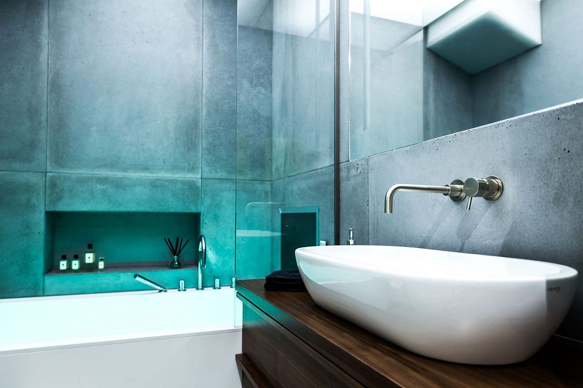 Plexiglass panels and lit ceiling give the contemporary bathroom a great ambiance