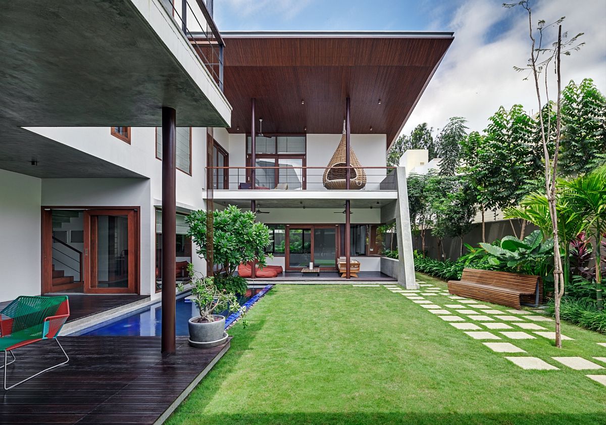 Pool and outdoor living spaces of the stylish home in Hyderabad
