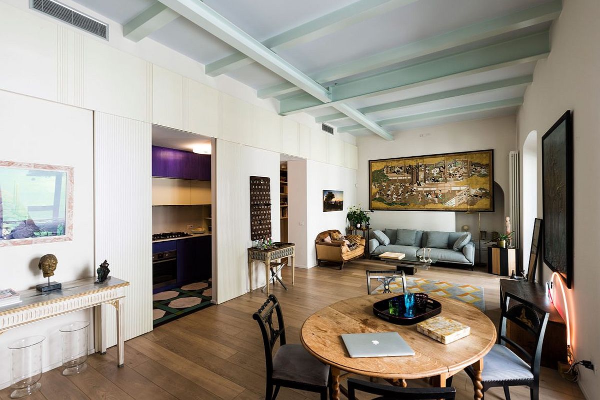 Restored and reinforced original ceiling beams of the modern apartment