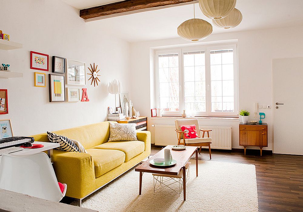 Scandinavian style living room lets the yellow couch become the star of the show