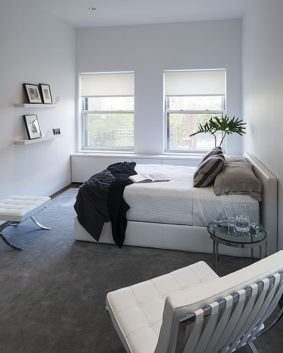 Serene white bedroom of the NoHo Loft