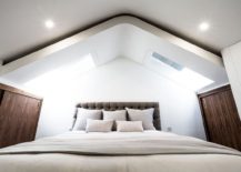Skylights-bring-ample-natural-light-into-the-mezzanine-level-bedroom-217x155