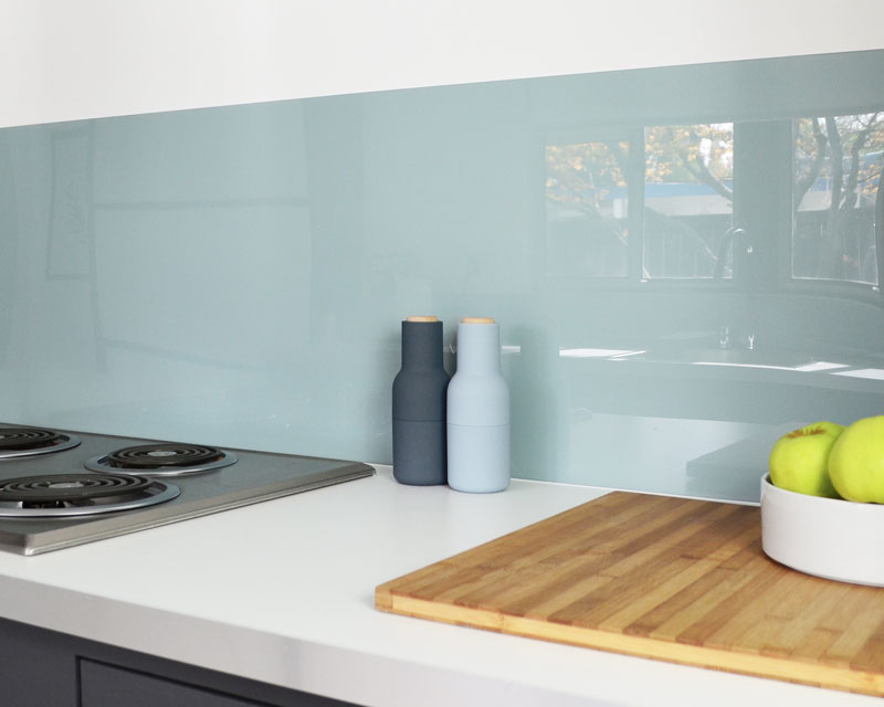 Sleek acrylic backsplash from fogmodern