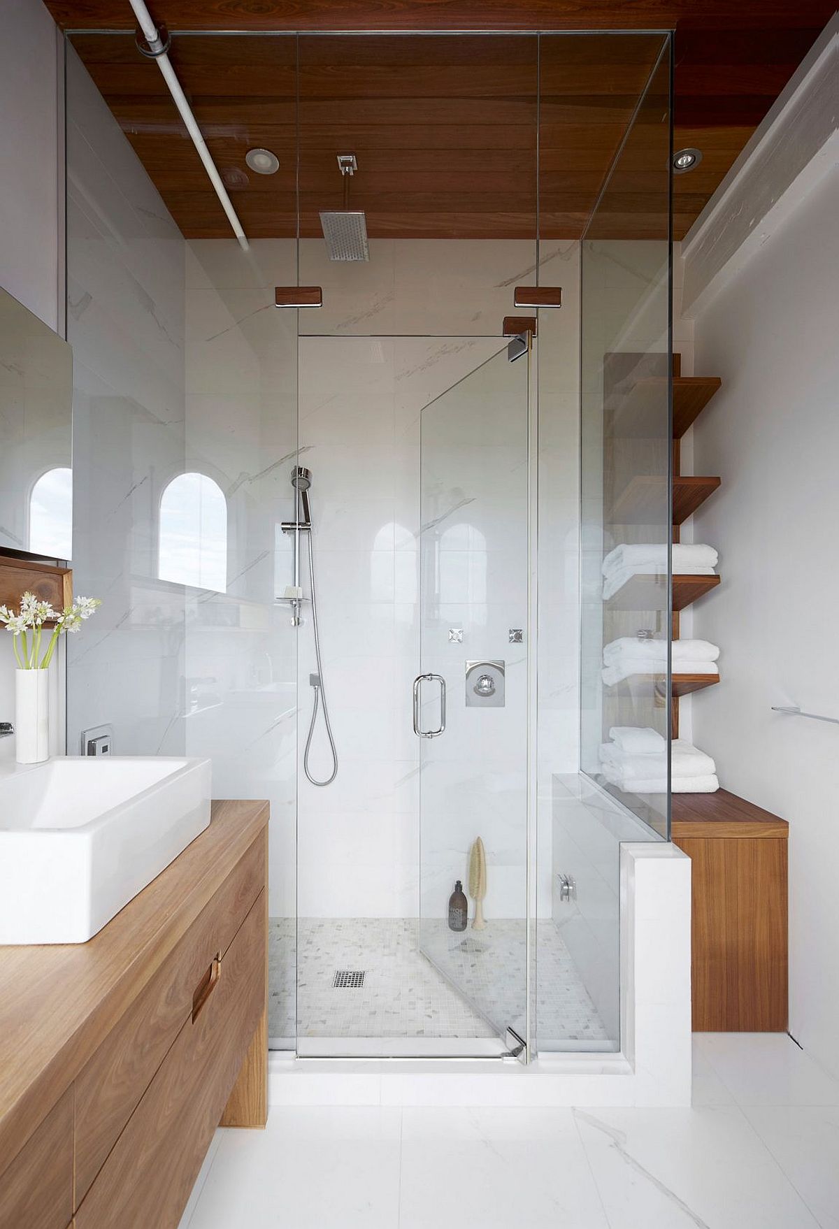 Small glass shower area of the modern bathroom