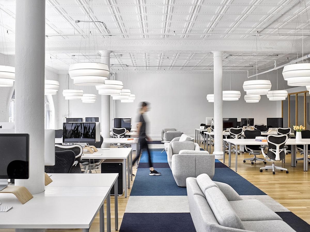 Smart arrangement of desks creates a vibrant workspace inside the Karma HQ