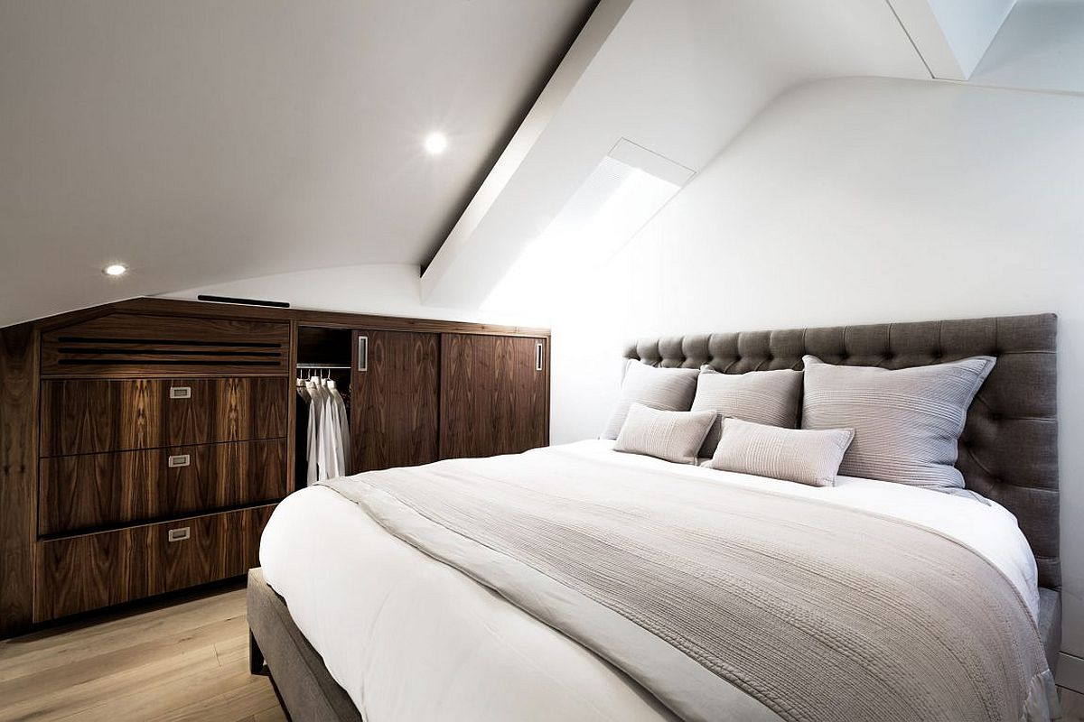 Space-savvy and serene master bedroom inside the penthouse that was once an orthodox London church