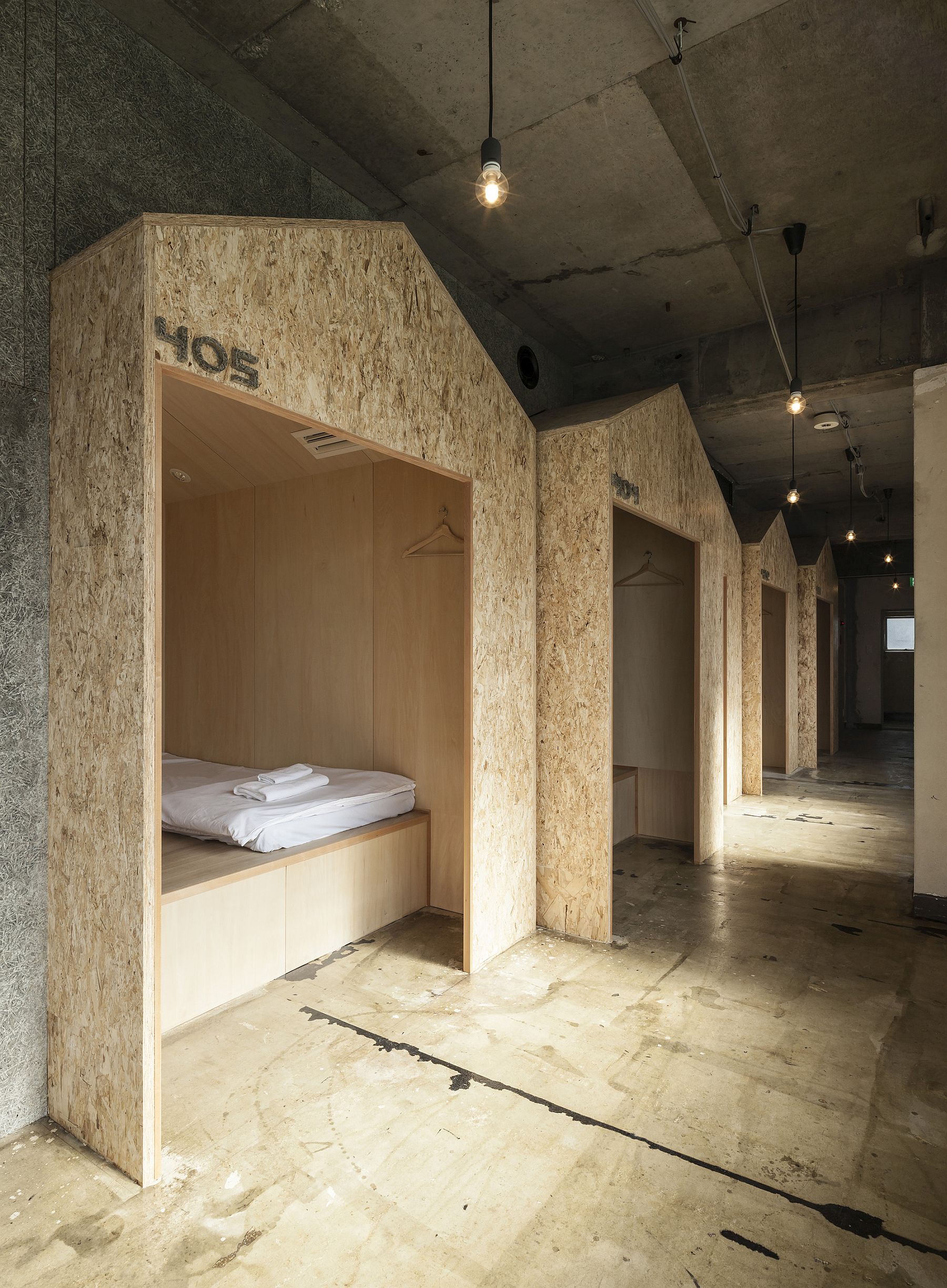 Space-savvy sleeping huts inside the Tokyo hostel