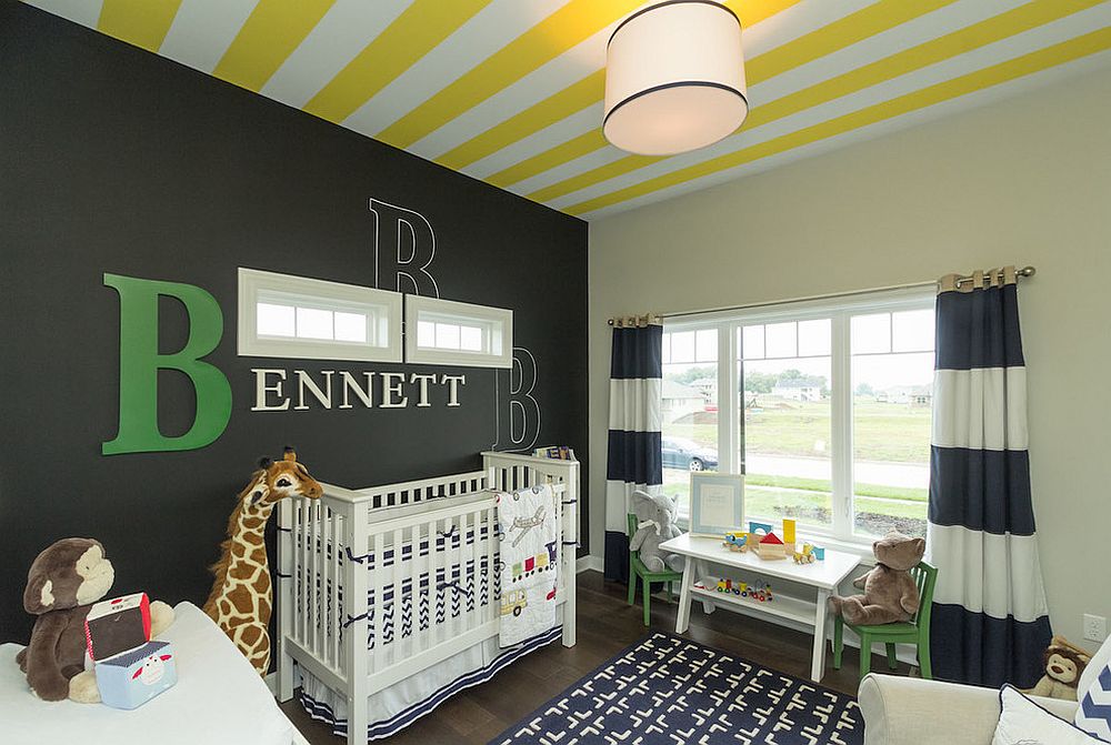 Striped ceiling in white and yellow and accent wall in black for the nursery